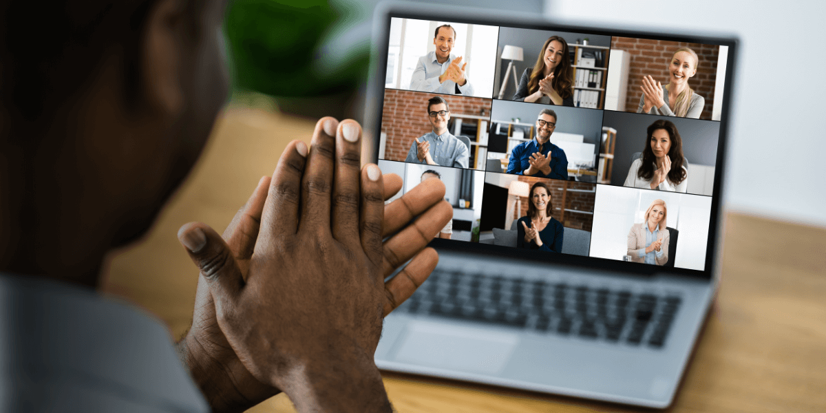 A man using a laptop on a video conference sales call, closing a deal with potential customers, using AI tools in the process to automate task that do not require human nuance