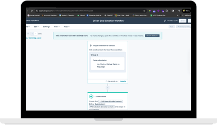 A computer that contains an image of a HubSpot workflow for UV Logisitics (1)-1