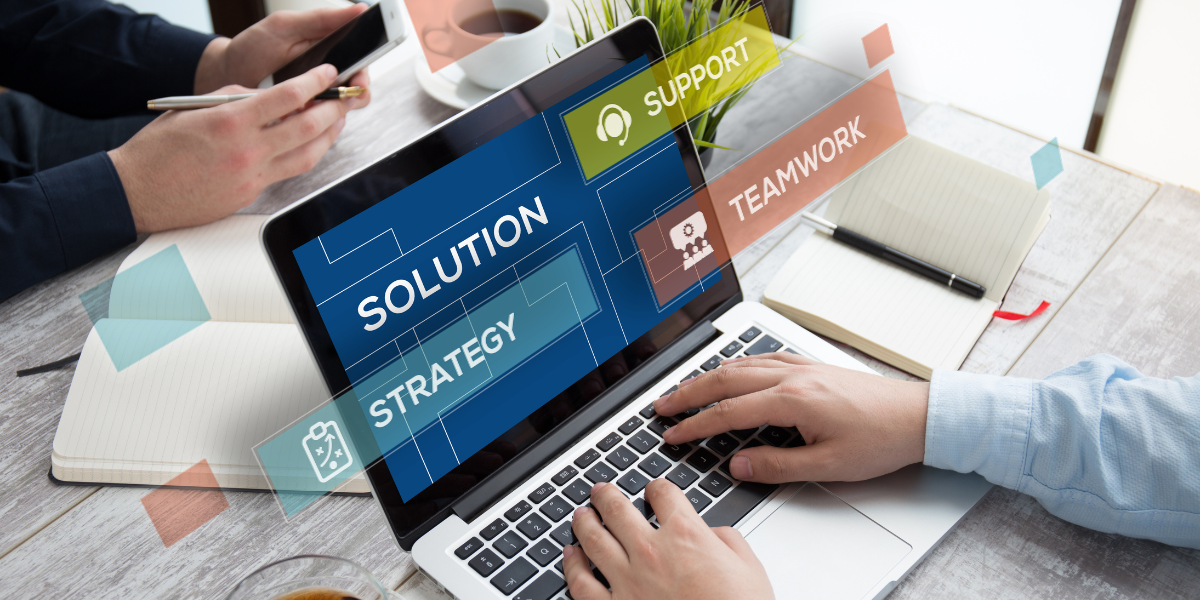 Solution, strategy, technology on a laptop screen with someone typing on keyboard